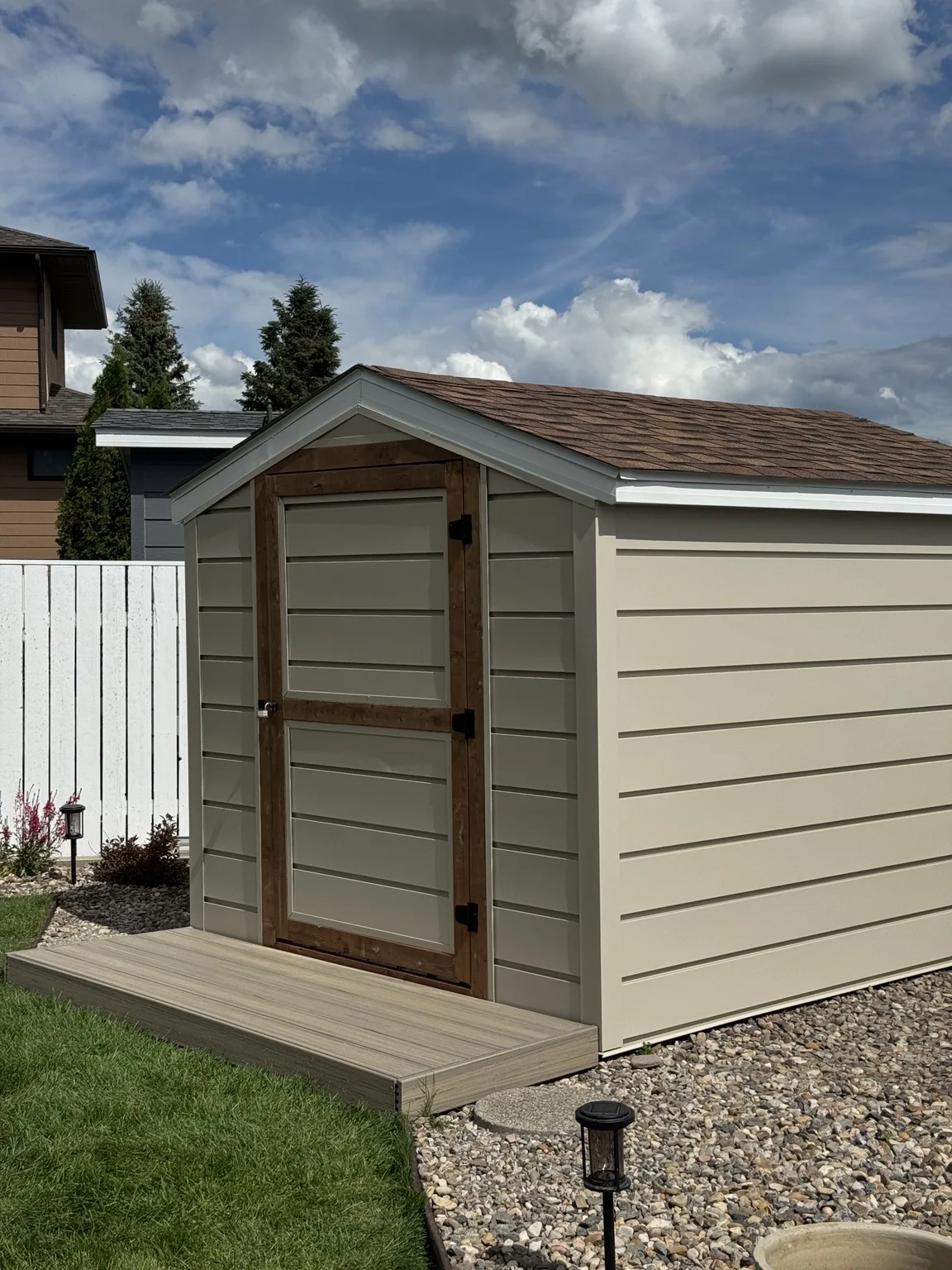 Re-sided backyard shed with contrasting trim
