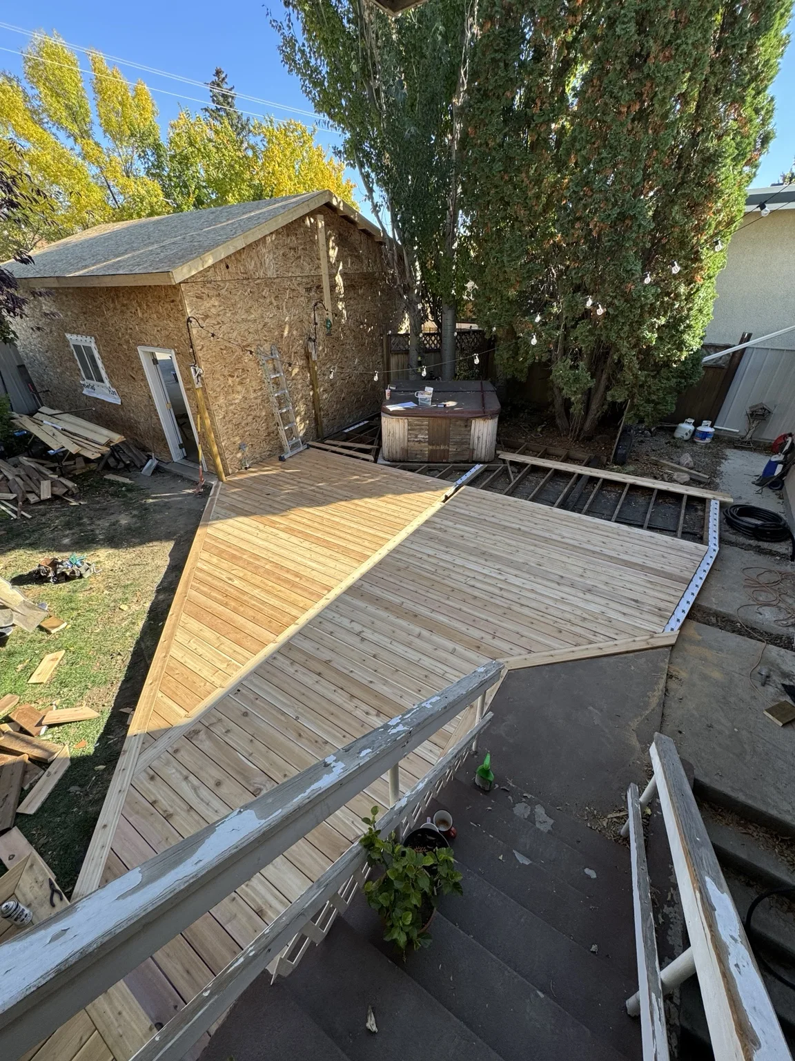 Custom cedar deck with picture-frame decking in progress